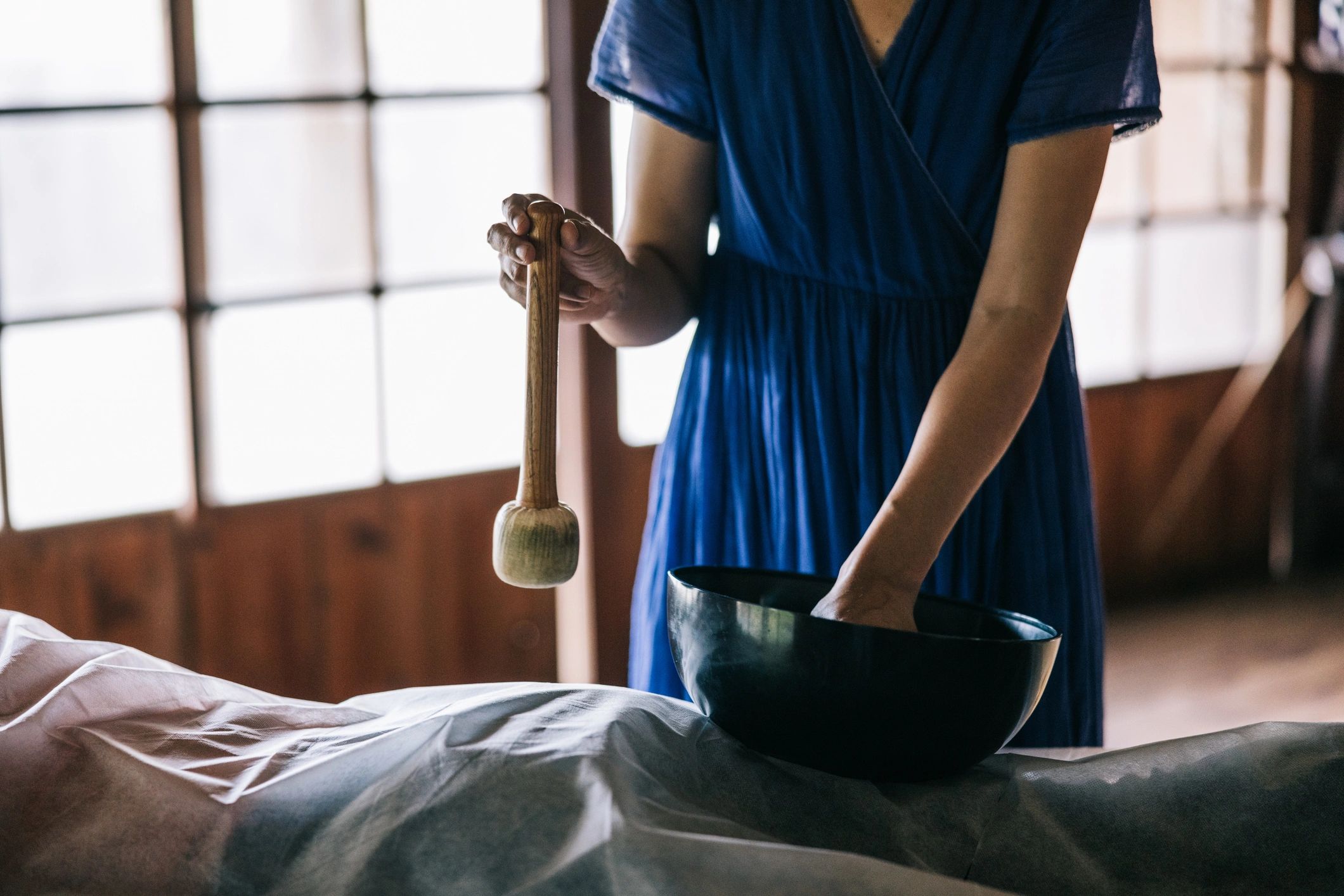 Healing bowl therapy in a calming wellness environment